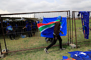 A man draped in a South African flag at a DA rally in Eldorado Park on Thursday.