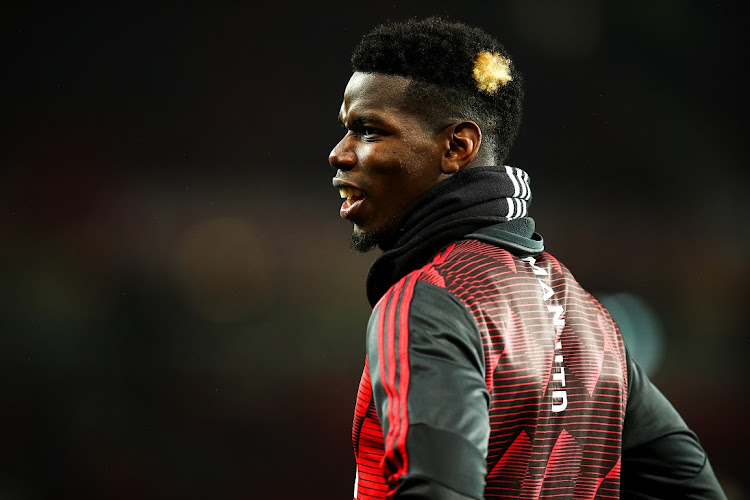 Paul Pogba of Manchester United warms up during the Premier League match against Newcastle United at Old Trafford on December 26.
