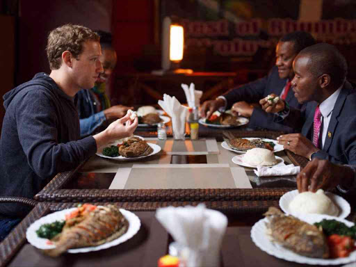 Facebook founder Mark Zuckerberg have lunch with Kenya's ICT CS Joe Mucheru at Mama Oliech's restaurant in Nairobi Photo/Facebook