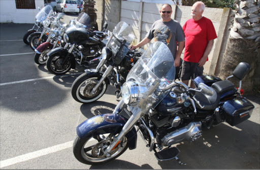 REVVED UP: Biker Andre Bester from the Book Club in PE and founder of the rally, Pierre Gonneau Picture: MICHAEL PINYANA