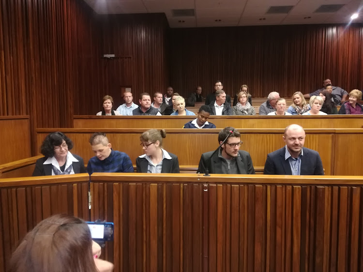The Krugersdorp murder accused in the dock are, from left to right, Marinda Steyn, Cecilia Steyn (no relation), Marcel and Le Roux Steyn (Marinda's children) and Zak Valentine.