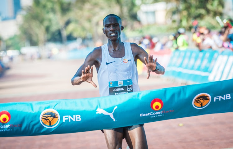 Joshua Cheptegei claims gold at the inaugural FNB Durban 10K CITYSURFRUN in 2017.