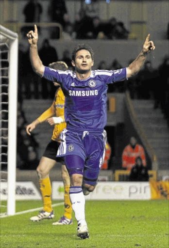 HERO: Chelsea's Frank Lampard celebrates his goal against Wolves on Monday.