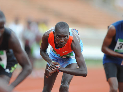 world 1,500m champion Asbel Kiprop starts his stopwatch during a previous Athletics meet kasarani./file