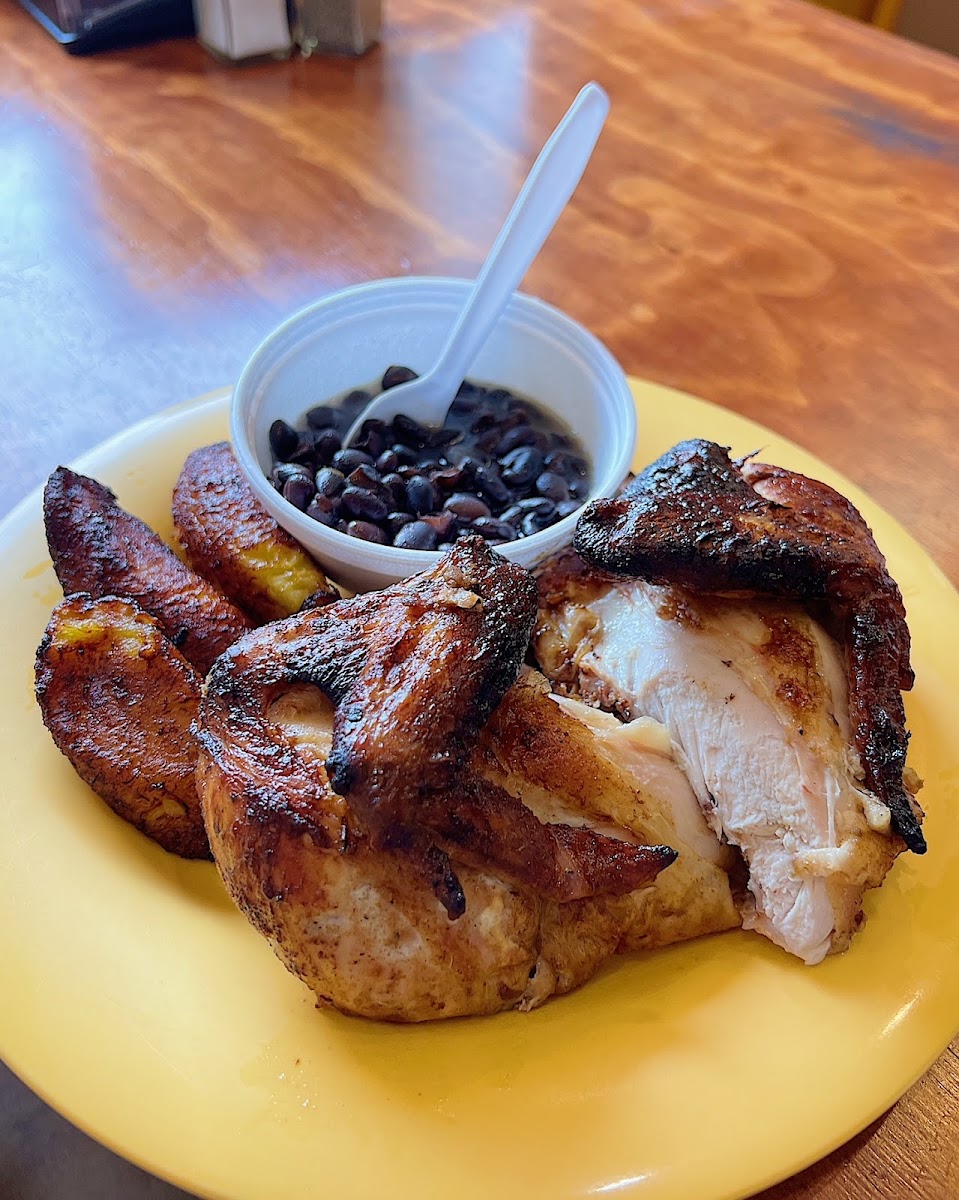 Half chicken, beans and plantains