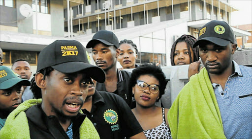 TIGHTLIPPED: Walter Sisulu university’s R14-million student, Sibongile Mani, made her first media appearance outside the Eskom House campus yesterday accompanied by Pasma members Picture: BHONGO JACOB