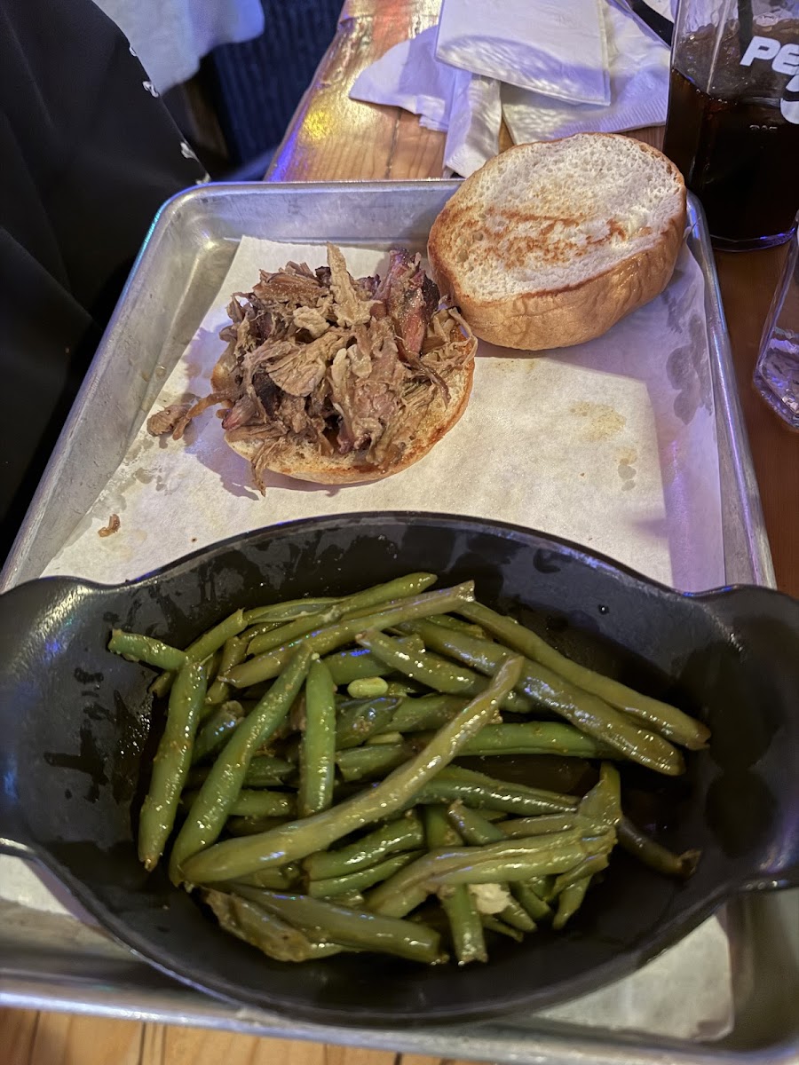 Pulled pork sandwgich subbed with a GF bun and subbed green beans since fryer isn't safe