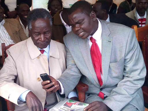 Ainabkoi aspirant William Chepkut with Nicholas Biwott at a function in Eldoret. /FILE