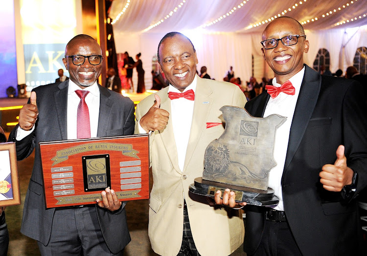 Britam’s Head of Financial Advisors Network Joseph Waithaka, Group Managing Director Tom Gitogo, and Britam Life General Manager Business Development Dennis Mworia celebrate winning the Life Company of the Year Award 2023 for the 17th consecutive year at the Annual Association of Kenya Insurers Awards 2023.