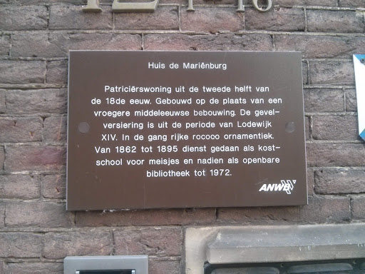 Background:This plaque, placed street-side on a Dutch national monument, describes the history of the building.Original Dutch text:Patricierswoning uit de tweede helft van de 18de eeuw. Gebouwd op...