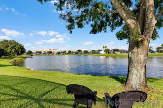 Sit back and enjoy the stunning lake view from this Formosa Gardens vacation villa