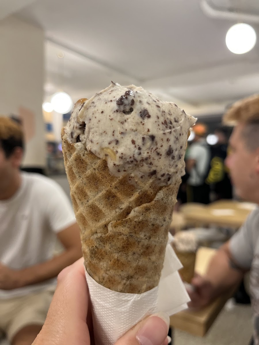 Vegan Snikers ice cream with gluten free waffle cone