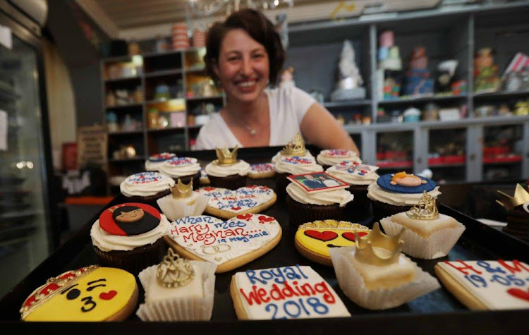 Alexandra Biess of Premier Chocolate Wedding Cake Bakery, Charly's Bakery shows the biscuits and cupcakes of Prince Harry and Meghan Royal Wedding.