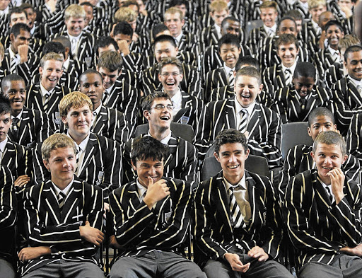 Pupils at Jeppe Boys High enjoy a lighter moment. The boys-only school has survived three wars, closure and financial difficulties to become an institution that places at its core the development of character and being of service to others