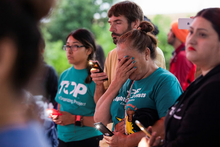 Maria Victoria de la Cruz reacts during a vigil for migrants who were found dead inside a trailer truck in San Antonio, Texas, US on June 28, 2022.