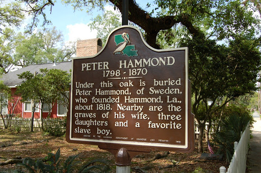 Under this oak is buried Peter Hammond, of Sweden, who founded Hammond, La., about 1818. Nearby are the graves of his wife, three daughters, and a favorite slave boy 