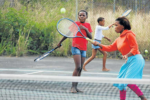 BALL SENSE: Anitha Makhonkco and Azasakhe Maseti practise at the NU1 Tennis Court through the Tennis Buffalo City initiative Picture: SIBONGILE NGALWA
