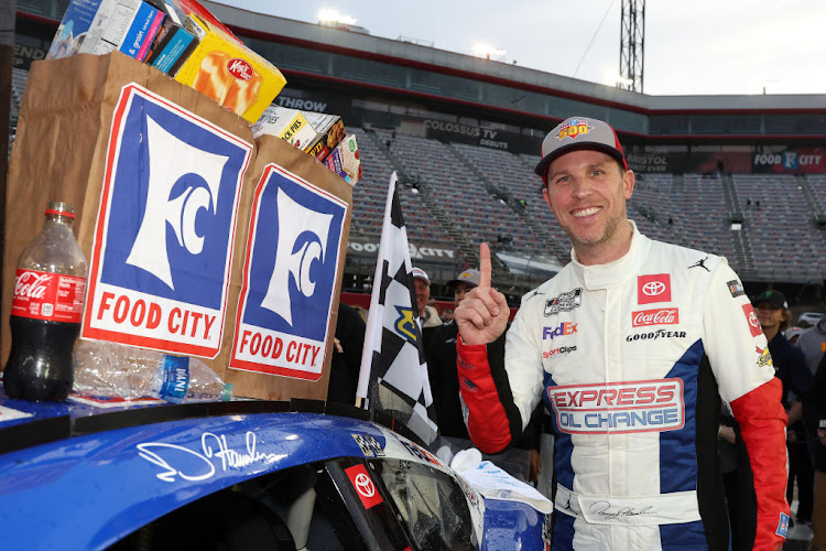Denny Hamlin with the winner sticker on his car after winning the NASCAR Cup Series Food City 500 at Bristol Motor Speedway on March 17 2024 in Bristol, Tennessee.
