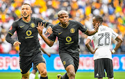 Lebogang Manyama of Kaizer Chiefs celebrates with teammate Samir Nurkovic of Kaizer Chiefs after scoring during the Absa Premiership match between Orlando Pirates and Kaizer Chiefs at FNB Stadium on February 29, 2020 in Johannesburg, South Africa. 