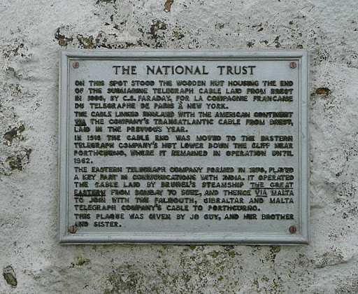This is the plaque attached to the cable monument, a monument to the coming ashore here of the first trans-Atlantic submarine telegraph cable. It used to stop in a wooden hut here until relaid...