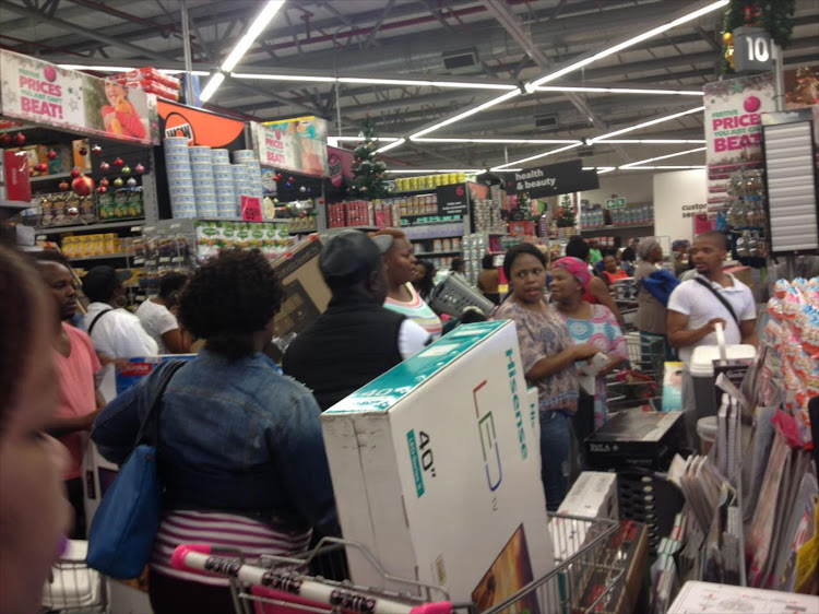 Shoppers queue during Black Friday sales in East London. An analysis of social media showed consumers believed Black Friday offered disappointing discounts and underwhelming offerings. In the US discounts of up to 80% were common while in SA discounts averaged 20% in stores and online.