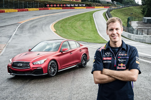 F1 driver Sebastian Vettel at the Eau Rouge corner with the Infiniti Q50 Eau Rouge.