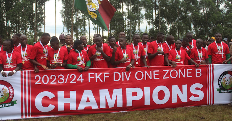 APs Bomet after being crowned the FKF Division one zone B league champions at Chepngaina Primary School playground in Bomet county on Sunday.