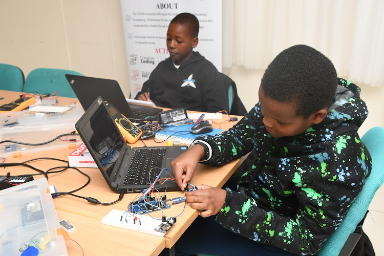 Learners of Cohort 1 2023 work on Arduino prototype sensors in one of their Robotics 2: Arduino and IoT sessions at the Centre for Mathematics, Science and Technology Education in Africa in Karen, Nairobi.