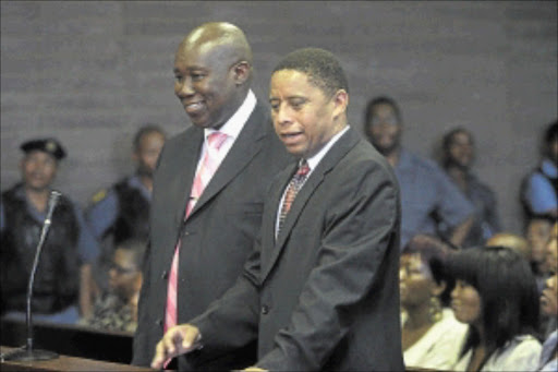 PARTNERS IN CRIME: Former mayor of Rustenburg local municipality Mathew Wolmarans and his bodyguard Enoch Matshaba in court. PHOTO: Veli Nhlapo