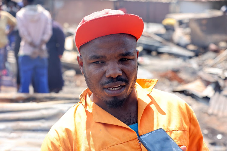 Tankiso Molipi a resident in the informal settlent after a storm in Kameeldrift, near Moloto road in Pretoria east.