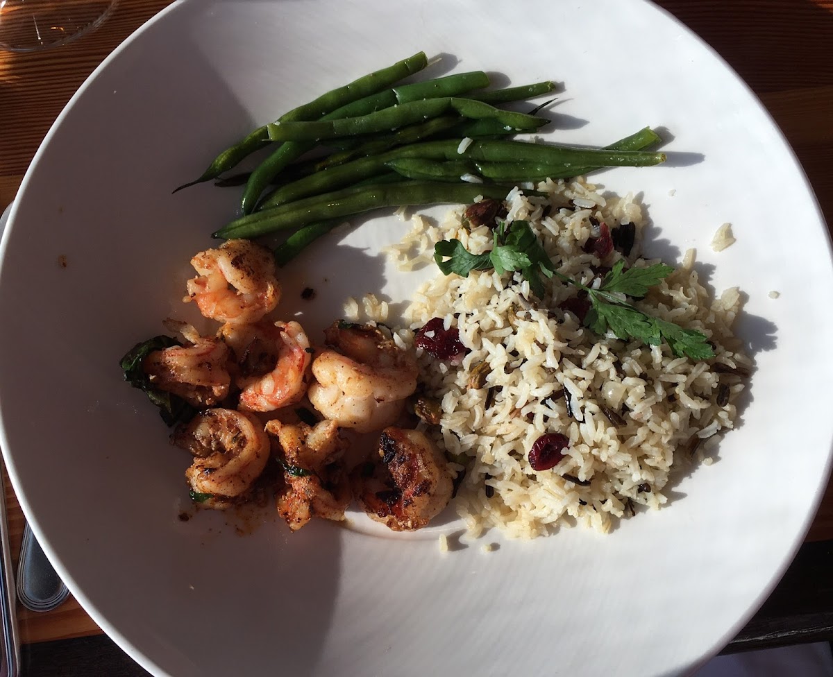 Barbecued Garlic Prawns sautéed New Orleans   style with Craisin Pistachio Rice Pilaf and Green Beans. Roasted red potatoes comes standard with this prawns dish—I substituted rice pilaf.