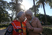 First Nations Leader and Biripi Elder, Ali Golding (L), is embraced by a member of the community during the Coloured Digger Anzac Day service and march at Redfern on April 25, 2024 in Sydney, Australia.