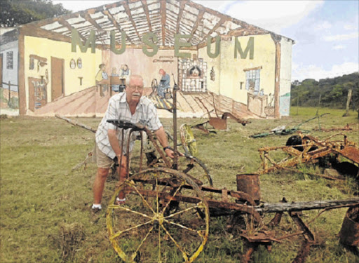 SAVED FROM THE SCRAP HEAP: Bathurst agricultural museum curator Buks Marais seen here with some rescued farm implements Picture: DAVID MACGREGOR