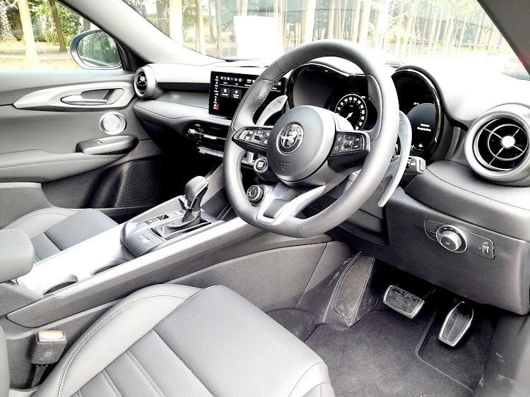 The cabin is fairly spacious and the dashboard is made from soft touch materials — including the steering wheel. Picture: PHUTI MPYANE