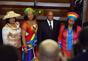 Jacob Zuma poses for photographs with his three wives Sizakele Khumalo, Nompumelo Ntuli and Thobeka Madiba.