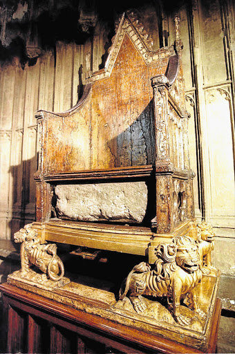 ROYAL ROCK: The historic Stone as it was kept in King Edward's Chair in Westminster Abbey. It has since been returned to Scotland, but will make its way back to London for future coronations