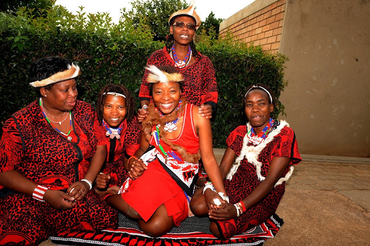 Lerato Mvelase (centre) with (L-R) Gobela Mahlasela Molefe, Mahamba Mashika, standing Mpande Modisane and Mogaetsi Mashishi during Lerato's graduation as a sangoma in Diepkloof ,Soweto, in December 2015.