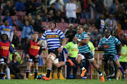 Juarno Augustus of Western Province on the attack during the Currie Cup match between DHL Western Province and Tafel Lager Griquas at DHL Newlands Stadium in Cape Town.