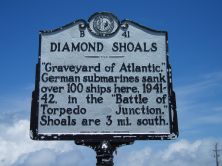 "Graveyard of Atlantic." German submarines sank over 100 ships here, 1941-42, in the "Battle of Torpedo Junction." Shoals are 3 mi. south.Plaque via North Carolina Highway Historical Marker...