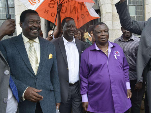ANC leader Musalia Mudavadi, Cord leader Raila Odinga and Cotu secretary general Francis Atwoli at St Stephens Church Jogoo Road on April 24 /EMMANUEL WANSON