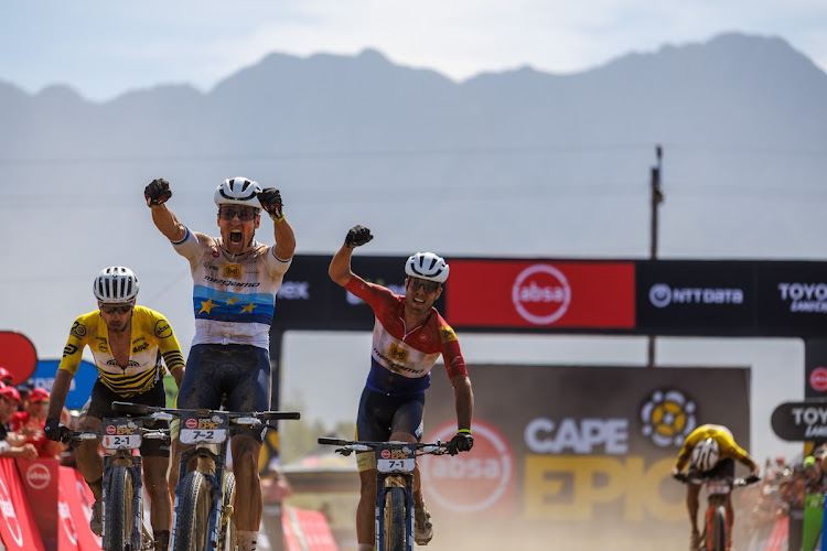 Wout Alleman, white top, and Hans Becking, red, win stage one of the Cape Epic. Picture: NICK MUNIZ/CAPE EPIC