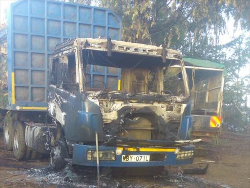 One of the trucks torched by residents in Kiptunga Forest, Nakuru county, after an accident that left two people dead, February 27, 2017. /COURTESY