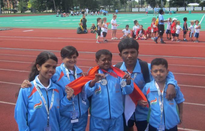 An Indian runner scoops up laurels at the World Dwarf Games