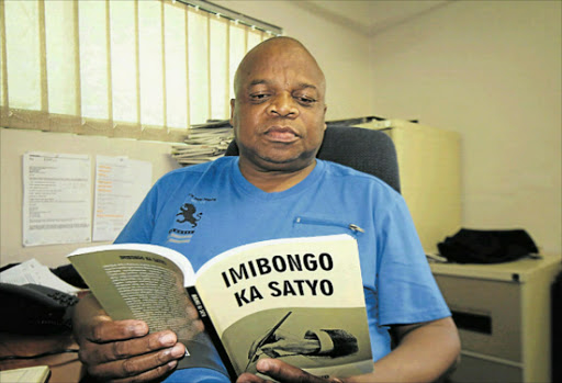 NEW CHAPTER: Lulamile Satyo and his book of poems written in IsiXhosa Picture: TEMBILE SGQOLANA