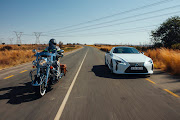 The Indian Chief Vintage (left) meets the Lexus LC 500 (right).