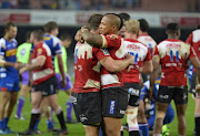  Elton Jantjies of the Lions and team mates celebrate during the Super Rugby match between DHL Stormers and Emirates Lions at DHL Newlands Stadium on May 26, 2018 in Cape Town, South Africa. 