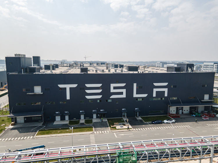 Tesla plans to lower production at its Shanghai factory, according to people familiar with the matter, in the latest sign demand in China isn’t meeting expectations.