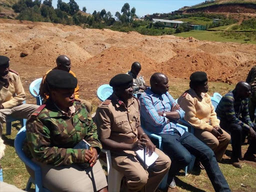 Marakwet East (Second left) Eric Mulevu and other security and local leaders at a peace meeting in Kamolokon on Wednesday/STEPHEN RUTTO