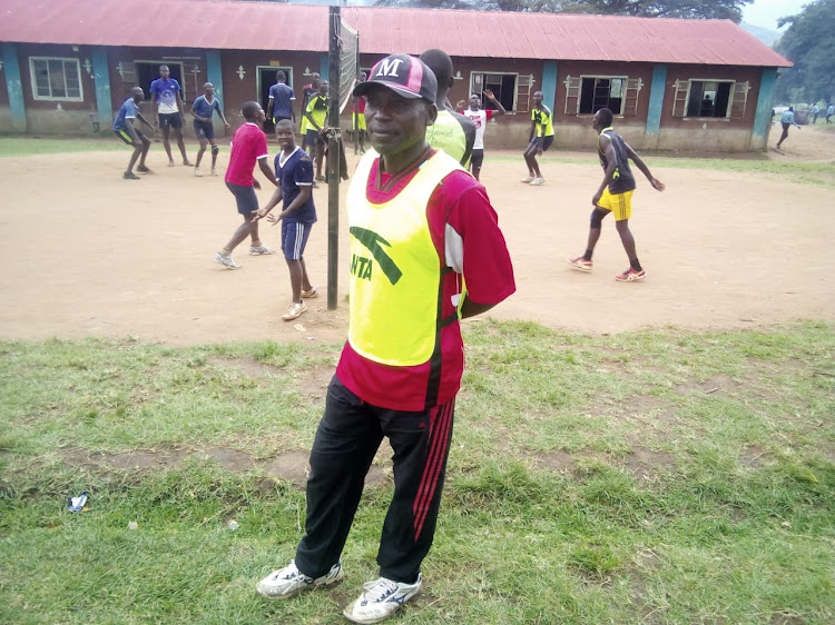 Namwela Secondary school volleyball head coach Isaac Muresia Nicholas during Tuesday evening training