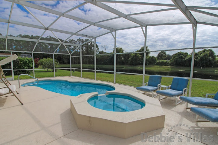 Lake view from the south-facing private pool and spa at this villa in Kissimmee